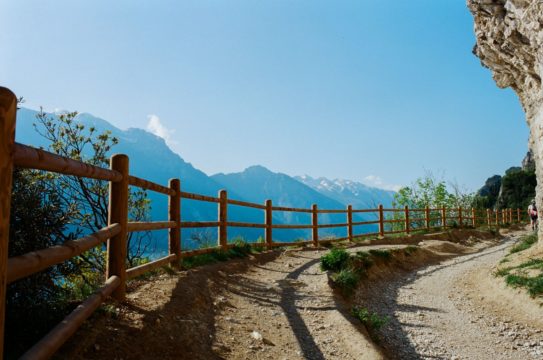 pathway in highland area with fence